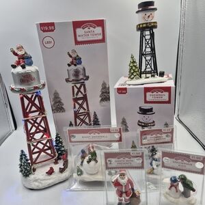 Santa Water Tower with LED Lights. Holiday Time Snowman Tower And 4 Figures